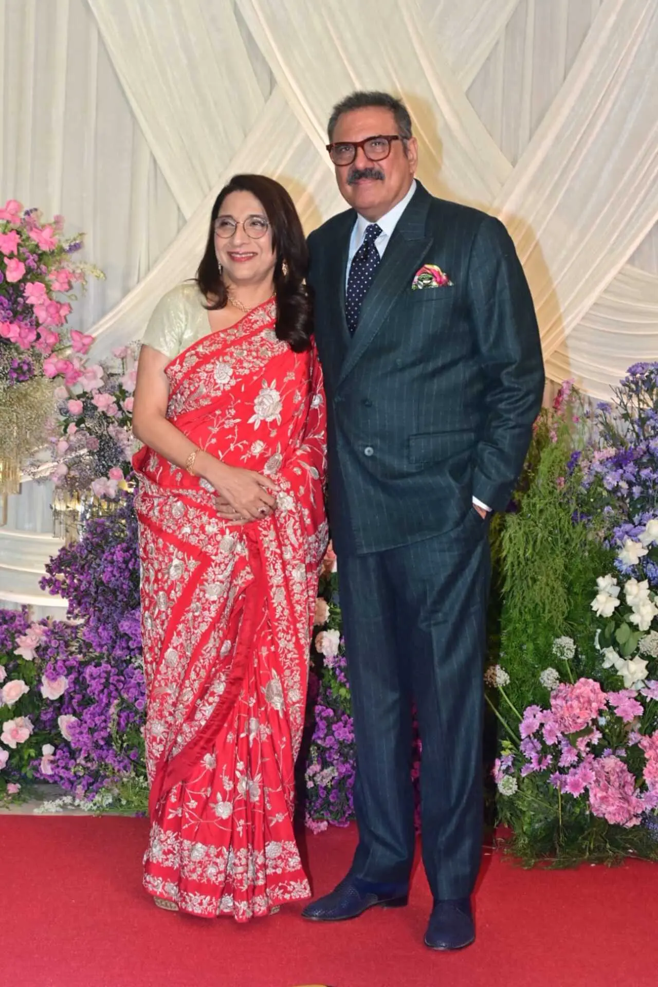 <p>Boman Irani also attended the reception with his wife Zenobia. The actor opted for sharp look in black suit set, which Zenobia complimented him in pink saree.</p>